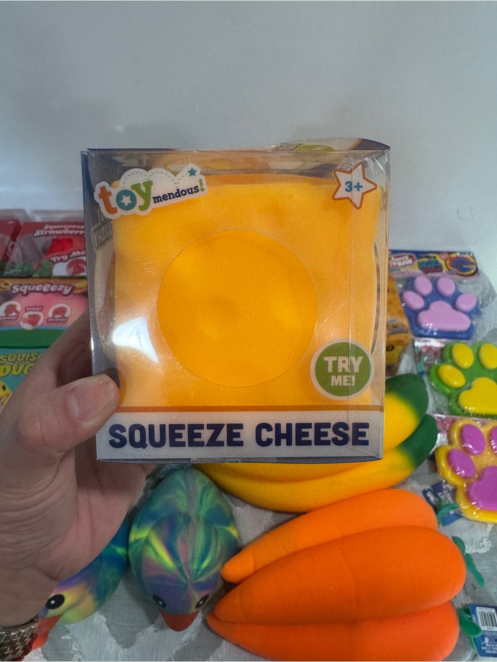 Que Squeeze Cheese Squishy Toy - Orange
